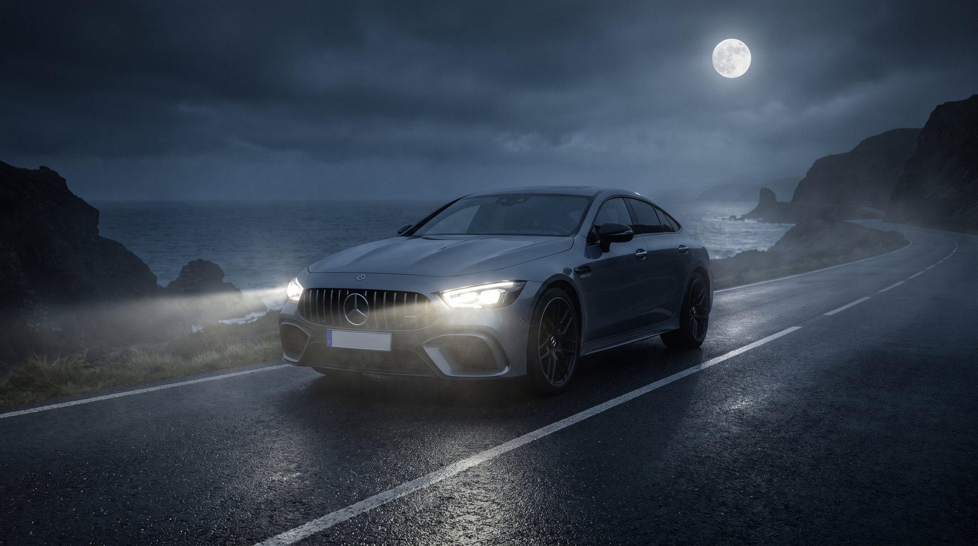 Sedan on a coastal road under a full moon