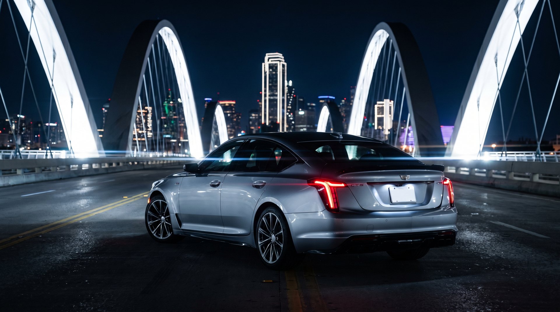 Sedan on an arched bridge at night